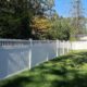 2 - White vinyl privacy fence with Closed Spindle topper