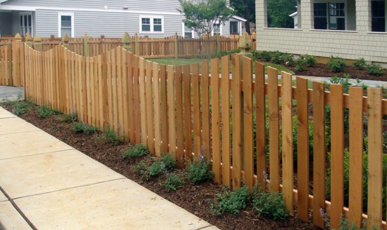 6-PICKET - Wood Picket Fence with a Concave Dip and French Gothic Posts