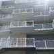 White Aluminum Balcony Railing on the back side of Ocean Waves in Ocean City MD