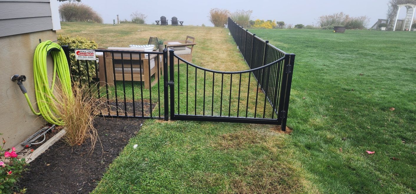 2-rail flat top Ascot style black aluminum fence with scalloped dop gate-min