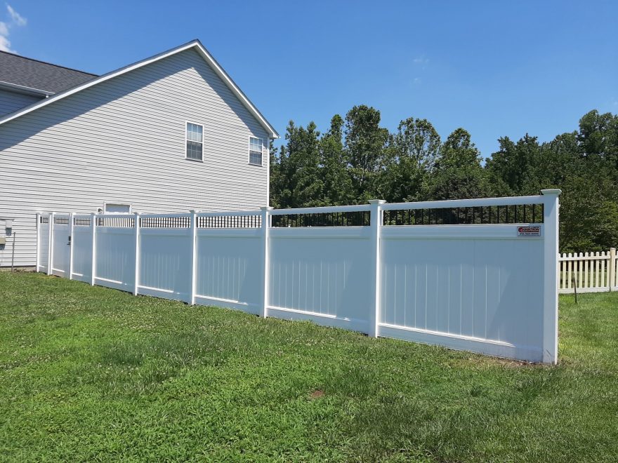 6 foot high white vinyl privacy fence with black aluminum spindle topper