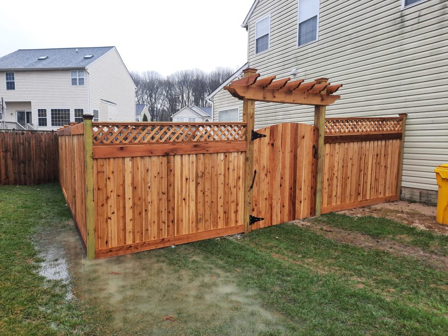 Board on batten style with 1x6 top and bottom fascia and new england post caps 2