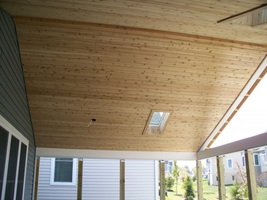 Inside the screened porch during the building process - the ceiling is finished with tongue and groove cedar with sunroof