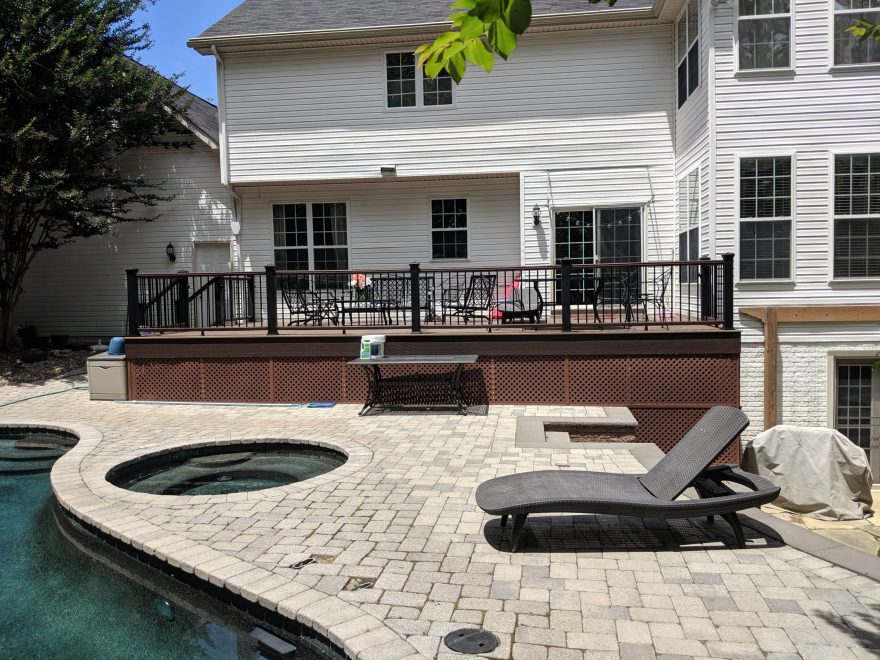 Trex Transcend Spiced Rum Deck Boards with Trex Composite Railing + Black Aluminum Balusters + Trex Composite Fascia and Redwood Vinyl Lattice in Edgewater MD