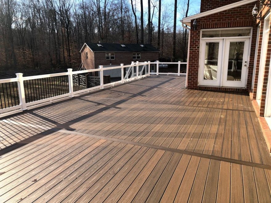 Trex Transcend Spiced Rum Deck Boards with White Washington Vinyl Railing and Black Aluminum Balusters in Upper Marlboro MD