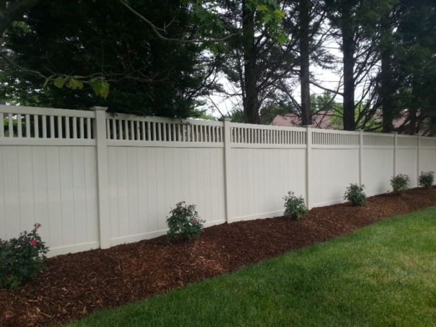 White Vinyl Privacy Fence with Closed Spindle Topper