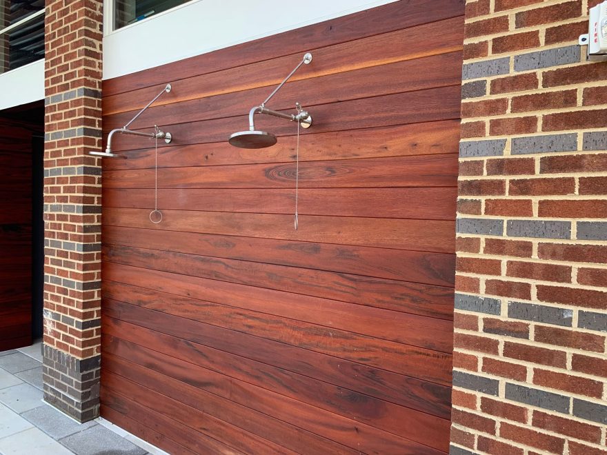 Wood Decking on the walls of the outdoor shower at Monarch at Waugh Chapel